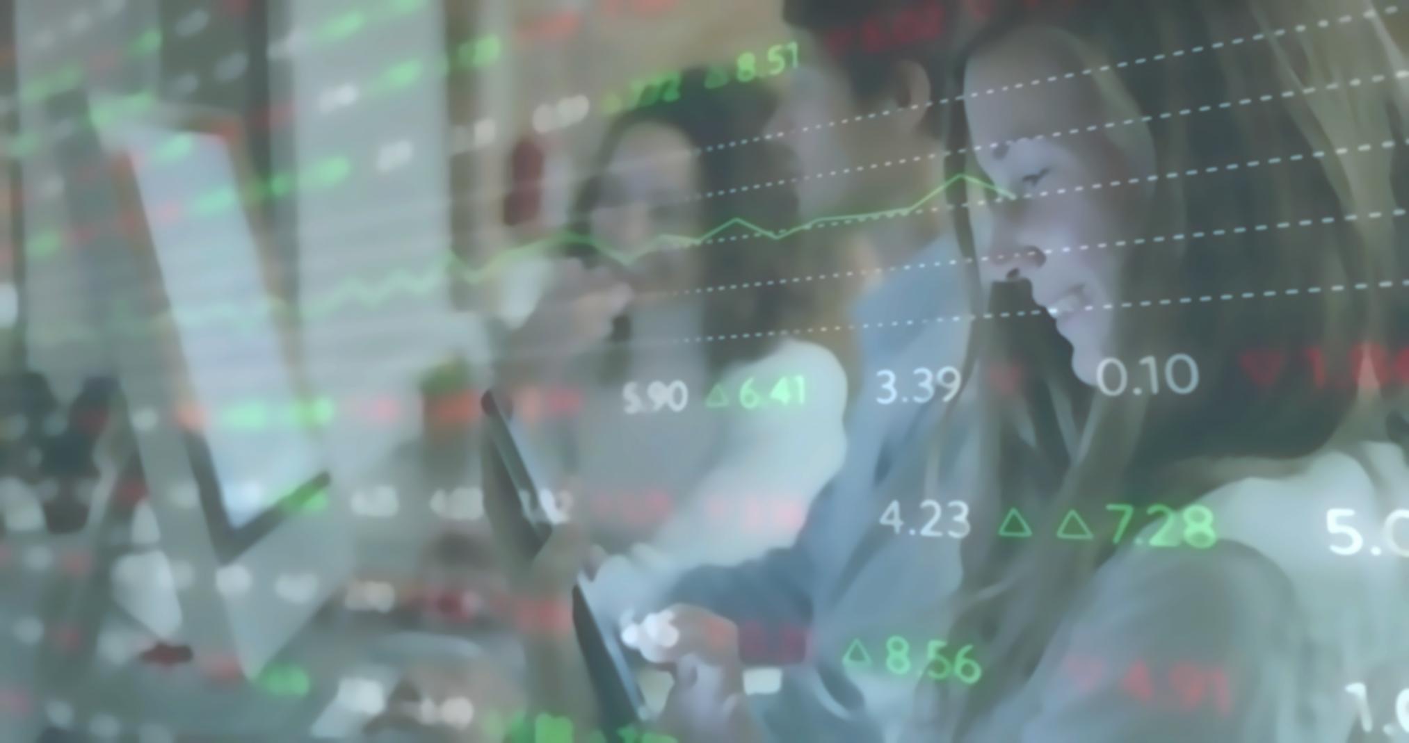 Students collaborating on blockchain development projects in workshop environment